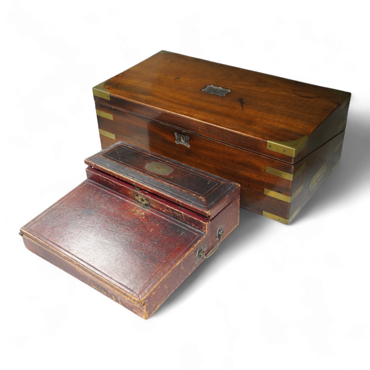 A Victorian brass bound mahogany writing slope and a Regency leather covered writing slope, 50cm wide